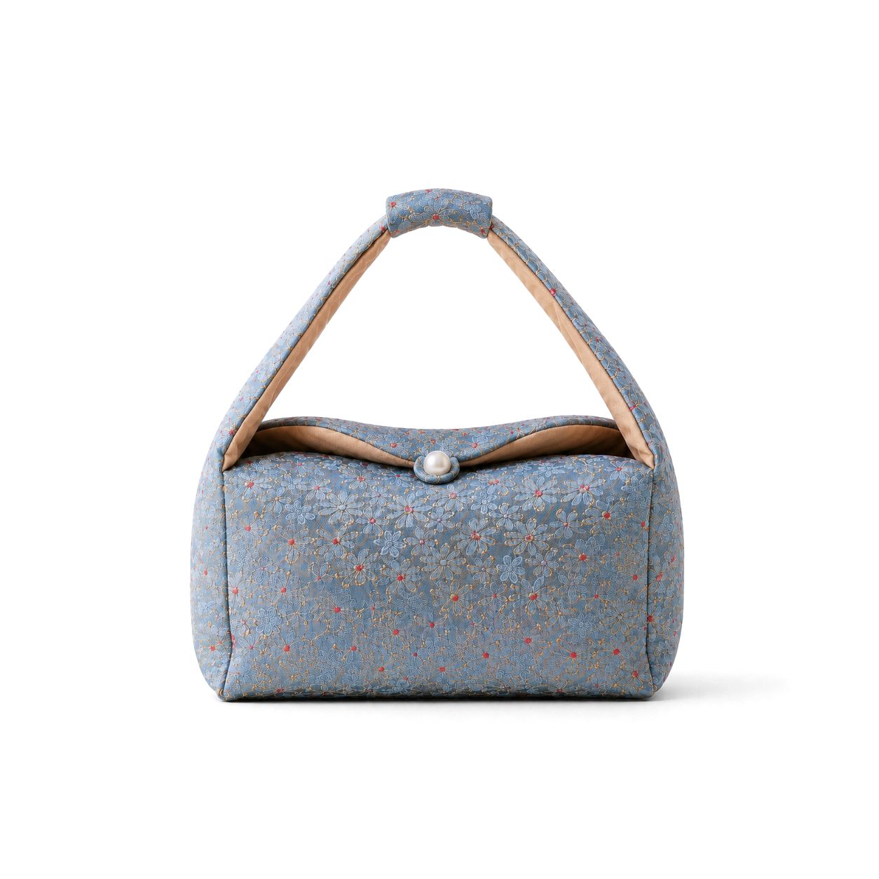 A small structured handbag with a light blue floral fabric body, tan leather handle, and a pearl snap closure, shown on a plain white background.